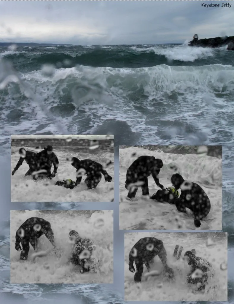 Divers getting knocked around in the surf during rough conditions at Keystone Jetty โ don't get tempted to dive when wind and waves are unfriendly.